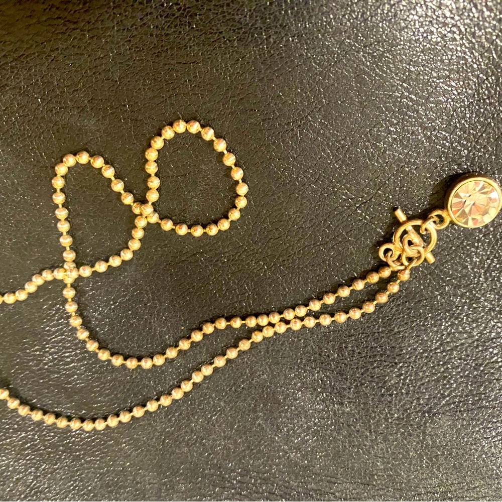 Silver tone ball beaded necklace with crystal